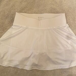 Women’s white athletic skirt with shorts.  Small S